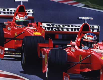 Schumacher leads Ferrari team mate Eddie Irvine during the 1998 Formula One World Championship. Ferrari Scuderia F300.